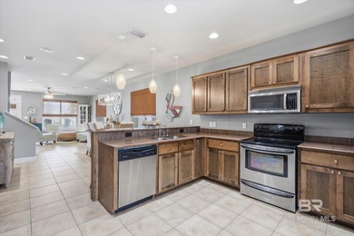 Experience coastal luxury in this beautifully designed 5-bedroom on Kiva Dunes Golf Club in Alabama - for sale on GolfHomes.com, golf home, golf lot