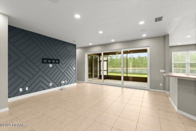 Step into this stunning lakefront smart home nestled in the on LPGA International Golf Course in Florida - for sale on GolfHomes.com, golf home, golf lot