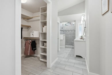 Live steps from the fairways in this Meadowwood home, set in a on Liberty Lake Golf Club in Washington - for sale on GolfHomes.com, golf home, golf lot