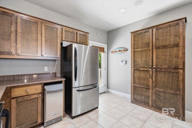 Experience coastal luxury in this beautifully designed 5-bedroom on Kiva Dunes Golf Club in Alabama - for sale on GolfHomes.com, golf home, golf lot