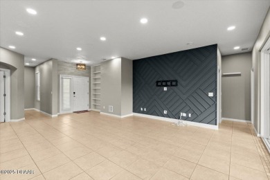 Step into this stunning lakefront smart home nestled in the on LPGA International Golf Course in Florida - for sale on GolfHomes.com, golf home, golf lot