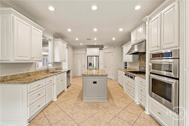 Stately custom-built brick home in the prestigious Southbridge on Southbridge Golf Club in Georgia - for sale on GolfHomes.com, golf home, golf lot