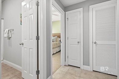 Experience coastal luxury in this beautifully designed 5-bedroom on Kiva Dunes Golf Club in Alabama - for sale on GolfHomes.com, golf home, golf lot