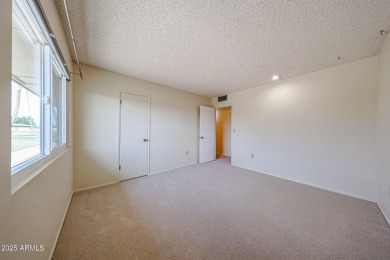 Welcome to this move-in-ready 2-bedroom, 2-bath end unit condo on Sun City Lakes West and East in Arizona - for sale on GolfHomes.com, golf home, golf lot