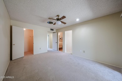 Welcome to this move-in-ready 2-bedroom, 2-bath end unit condo on Sun City Lakes West and East in Arizona - for sale on GolfHomes.com, golf home, golf lot