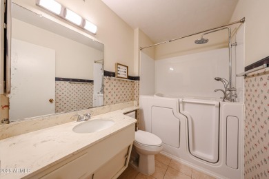 Welcome to this move-in-ready 2-bedroom, 2-bath end unit condo on Sun City Lakes West and East in Arizona - for sale on GolfHomes.com, golf home, golf lot