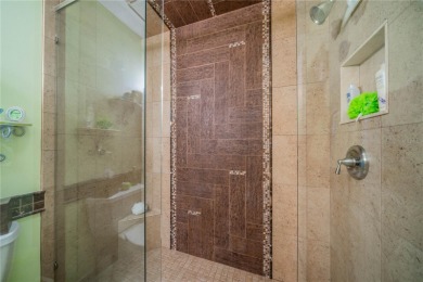 This is an exceptional condo! You need to see this one to on Falcon Watch Golf Club in Florida - for sale on GolfHomes.com, golf home, golf lot
