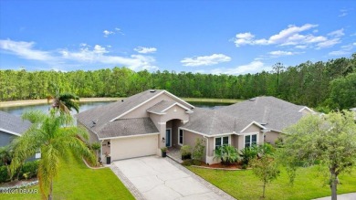Step into this stunning lakefront smart home nestled in the on LPGA International Golf Course in Florida - for sale on GolfHomes.com, golf home, golf lot