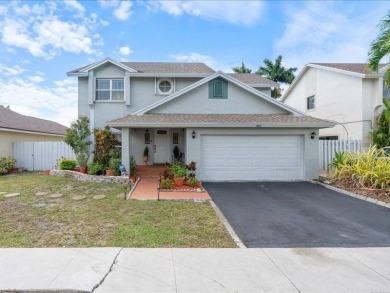 Where Lake Views, Lush Vibes, and Lasting Memories Await on Hollybrook Golf and Tennis Club  in Florida - for sale on GolfHomes.com, golf home, golf lot