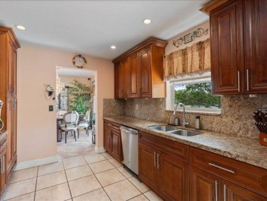 Where Lake Views, Lush Vibes, and Lasting Memories Await on Hollybrook Golf and Tennis Club  in Florida - for sale on GolfHomes.com, golf home, golf lot