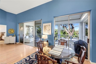 Perched along an idyllic tree-lined street within the Harbor on Bonita Bay West in Florida - for sale on GolfHomes.com, golf home, golf lot