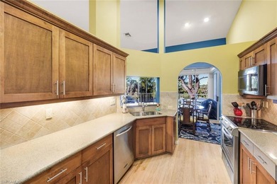 Perched along an idyllic tree-lined street within the Harbor on Bonita Bay West in Florida - for sale on GolfHomes.com, golf home, golf lot