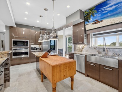 Experience the pinnacle of coastal living in this stunning on Hideaway Beach Golf Course in Florida - for sale on GolfHomes.com, golf home, golf lot