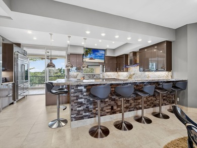 Experience the pinnacle of coastal living in this stunning on Hideaway Beach Golf Course in Florida - for sale on GolfHomes.com, golf home, golf lot