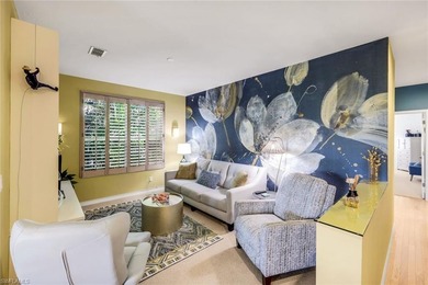 Perched along an idyllic tree-lined street within the Harbor on Bonita Bay West in Florida - for sale on GolfHomes.com, golf home, golf lot