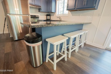 Completely updated and move-in ready! This contemporary home in on The Hideout Golf in Pennsylvania - for sale on GolfHomes.com, golf home, golf lot