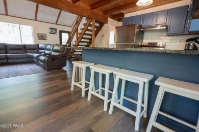 Completely updated and move-in ready! This contemporary home in on The Hideout Golf in Pennsylvania - for sale on GolfHomes.com, golf home, golf lot