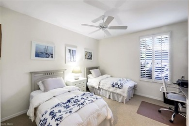 Perched along an idyllic tree-lined street within the Harbor on Bonita Bay West in Florida - for sale on GolfHomes.com, golf home, golf lot