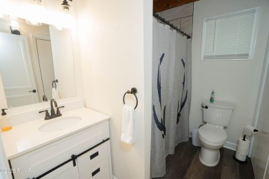 Completely updated and move-in ready! This contemporary home in on The Hideout Golf in Pennsylvania - for sale on GolfHomes.com, golf home, golf lot