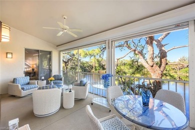 Perched along an idyllic tree-lined street within the Harbor on Bonita Bay West in Florida - for sale on GolfHomes.com, golf home, golf lot
