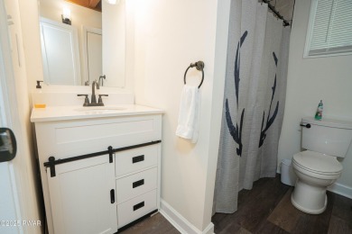 Completely updated and move-in ready! This contemporary home in on The Hideout Golf in Pennsylvania - for sale on GolfHomes.com, golf home, golf lot