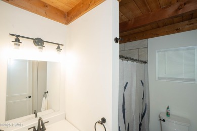 Completely updated and move-in ready! This contemporary home in on The Hideout Golf in Pennsylvania - for sale on GolfHomes.com, golf home, golf lot