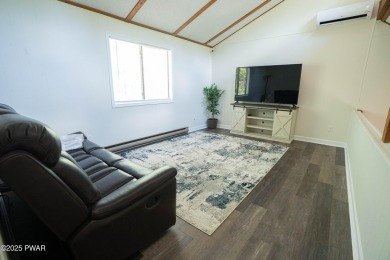 Completely updated and move-in ready! This contemporary home in on The Hideout Golf in Pennsylvania - for sale on GolfHomes.com, golf home, golf lot