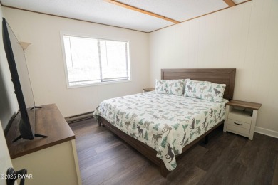 Completely updated and move-in ready! This contemporary home in on The Hideout Golf in Pennsylvania - for sale on GolfHomes.com, golf home, golf lot