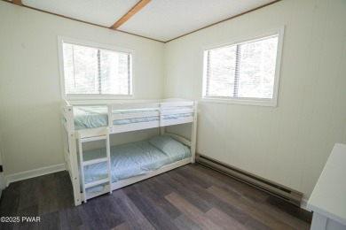 Completely updated and move-in ready! This contemporary home in on The Hideout Golf in Pennsylvania - for sale on GolfHomes.com, golf home, golf lot
