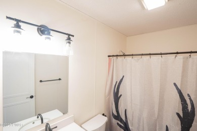 Completely updated and move-in ready! This contemporary home in on The Hideout Golf in Pennsylvania - for sale on GolfHomes.com, golf home, golf lot