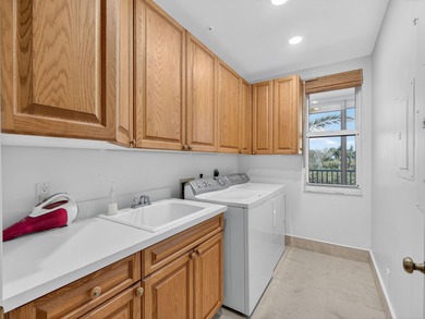 Experience the pinnacle of coastal living in this stunning on Hideaway Beach Golf Course in Florida - for sale on GolfHomes.com, golf home, golf lot