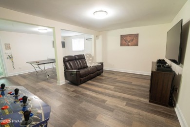 Completely updated and move-in ready! This contemporary home in on The Hideout Golf in Pennsylvania - for sale on GolfHomes.com, golf home, golf lot