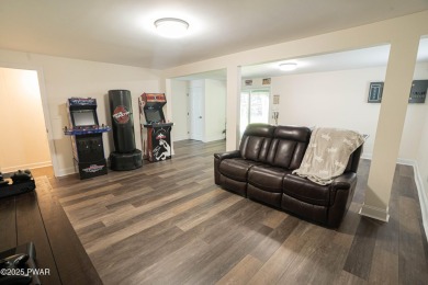Completely updated and move-in ready! This contemporary home in on The Hideout Golf in Pennsylvania - for sale on GolfHomes.com, golf home, golf lot