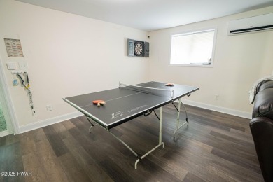 Completely updated and move-in ready! This contemporary home in on The Hideout Golf in Pennsylvania - for sale on GolfHomes.com, golf home, golf lot