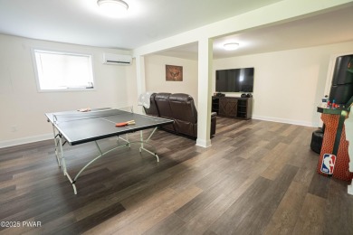 Completely updated and move-in ready! This contemporary home in on The Hideout Golf in Pennsylvania - for sale on GolfHomes.com, golf home, golf lot
