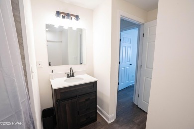 Completely updated and move-in ready! This contemporary home in on The Hideout Golf in Pennsylvania - for sale on GolfHomes.com, golf home, golf lot