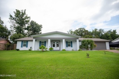 Welcome to this beautifully updated 3-bedroom, 2-bathroom home on Gulf Hills Golf Club in Mississippi - for sale on GolfHomes.com, golf home, golf lot