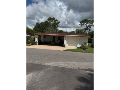 This beautifully maintained 3-bedroom, 2-bath Palm Harbor home on The Meadows At Countrywood in Florida - for sale on GolfHomes.com, golf home, golf lot