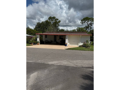 This beautifully maintained 3-bedroom, 2-bath Palm Harbor home on The Meadows At Countrywood in Florida - for sale on GolfHomes.com, golf home, golf lot
