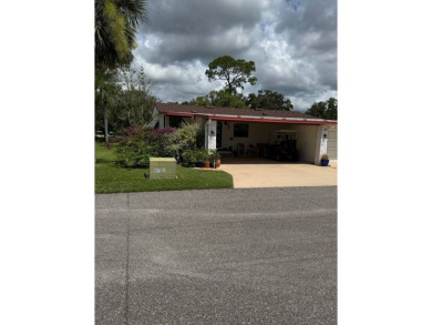 This beautifully maintained 3-bedroom, 2-bath Palm Harbor home on The Meadows At Countrywood in Florida - for sale on GolfHomes.com, golf home, golf lot