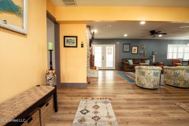 Welcome to this beautifully updated 3-bedroom, 2-bathroom home on Gulf Hills Golf Club in Mississippi - for sale on GolfHomes.com, golf home, golf lot