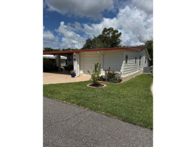 This beautifully maintained 3-bedroom, 2-bath Palm Harbor home on The Meadows At Countrywood in Florida - for sale on GolfHomes.com, golf home, golf lot