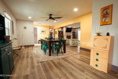 Welcome to this beautifully updated 3-bedroom, 2-bathroom home on Gulf Hills Golf Club in Mississippi - for sale on GolfHomes.com, golf home, golf lot