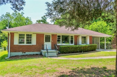 Beautifully renovated 4 bdrm, 2 bath home with Mid-Century vibes on Browns Mill Golf Course in Georgia - for sale on GolfHomes.com, golf home, golf lot
