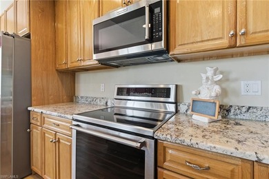 Step into the effortless elegance of Highland Woods Golf & on Highland Woods Golf and Country Club in Florida - for sale on GolfHomes.com, golf home, golf lot