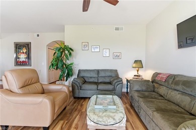 Step into the effortless elegance of Highland Woods Golf & on Highland Woods Golf and Country Club in Florida - for sale on GolfHomes.com, golf home, golf lot