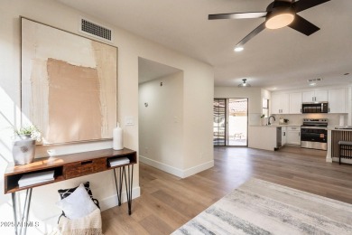 Step into this fully renovated gem, nestled in one of the most on The Lakes at Ahwatukee in Arizona - for sale on GolfHomes.com, golf home, golf lot