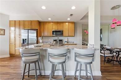 Step into the effortless elegance of Highland Woods Golf & on Highland Woods Golf and Country Club in Florida - for sale on GolfHomes.com, golf home, golf lot