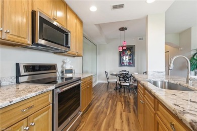 Step into the effortless elegance of Highland Woods Golf & on Highland Woods Golf and Country Club in Florida - for sale on GolfHomes.com, golf home, golf lot