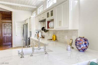 Tucked within the exclusive gates of Canyon Gate, this elegant on Canyon Gate Country Club in Nevada - for sale on GolfHomes.com, golf home, golf lot